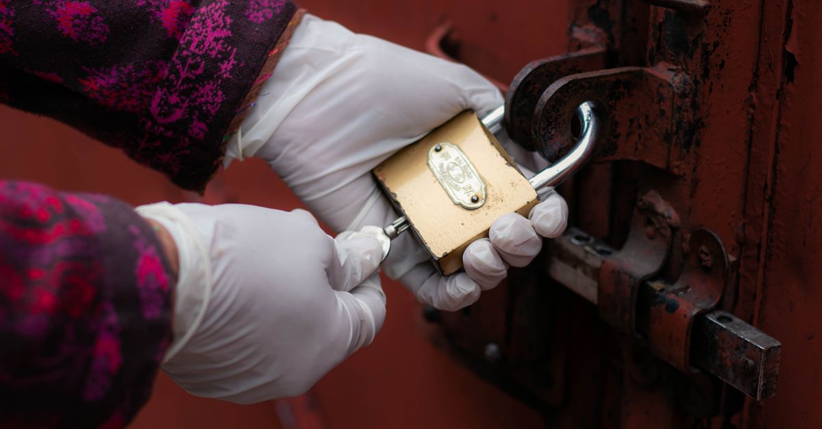 locksmith unlocking front door — Fast Locksmith Of Paramus